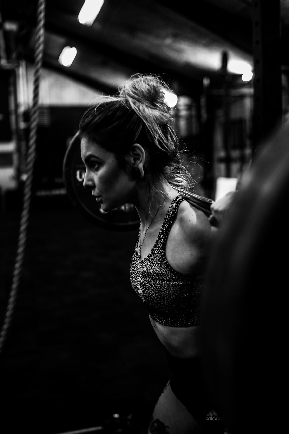 Woman working out in gym with energy