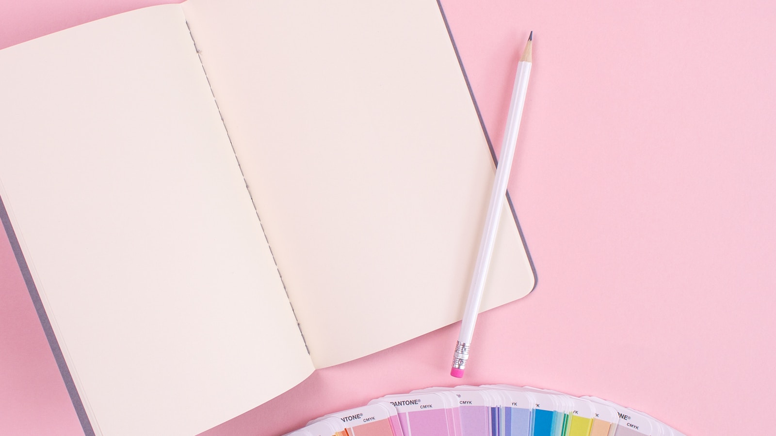 A mom lifting her kid up while the kid laughs