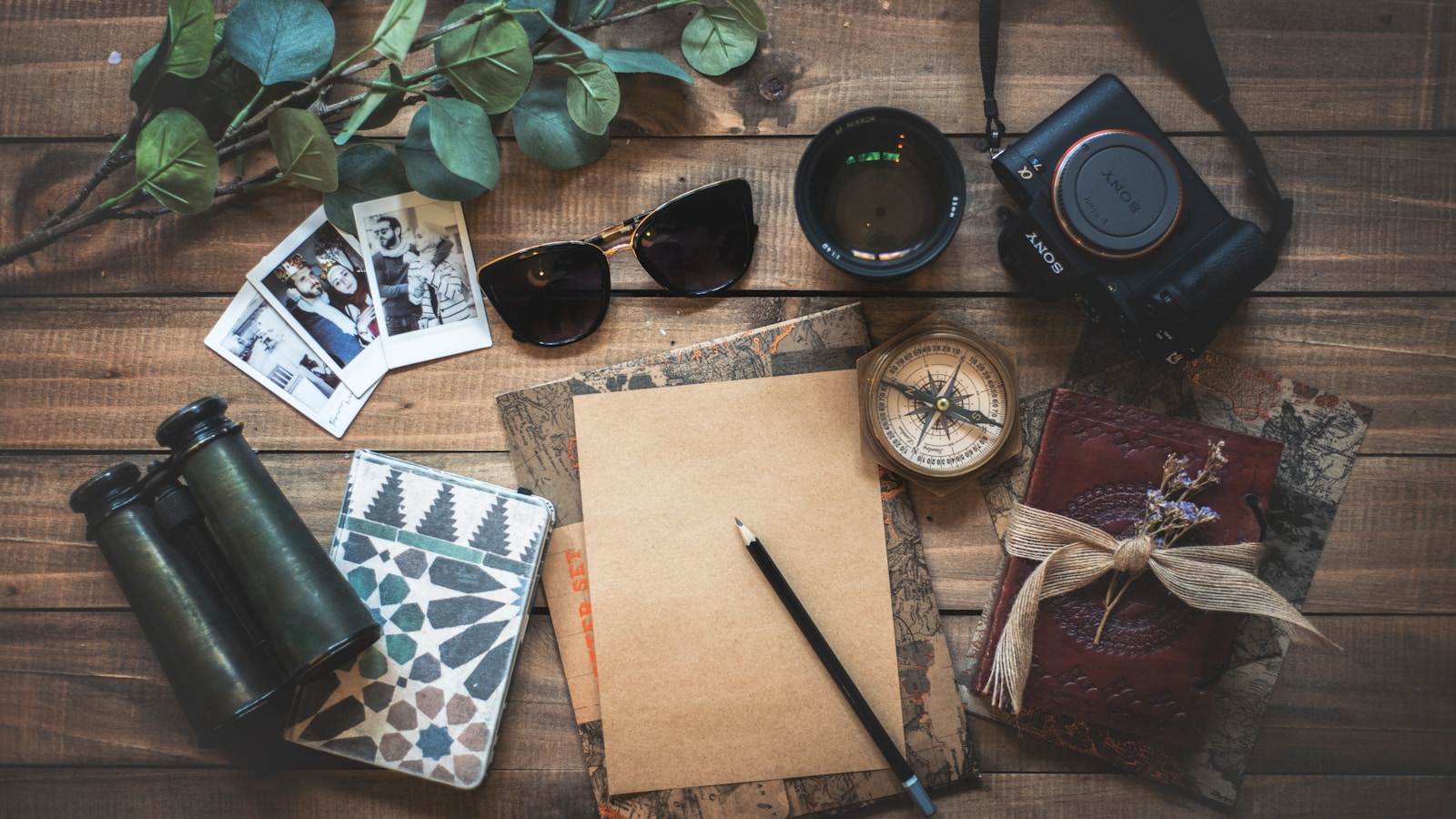Parent carrying a toddler on shoulders during a walk outside