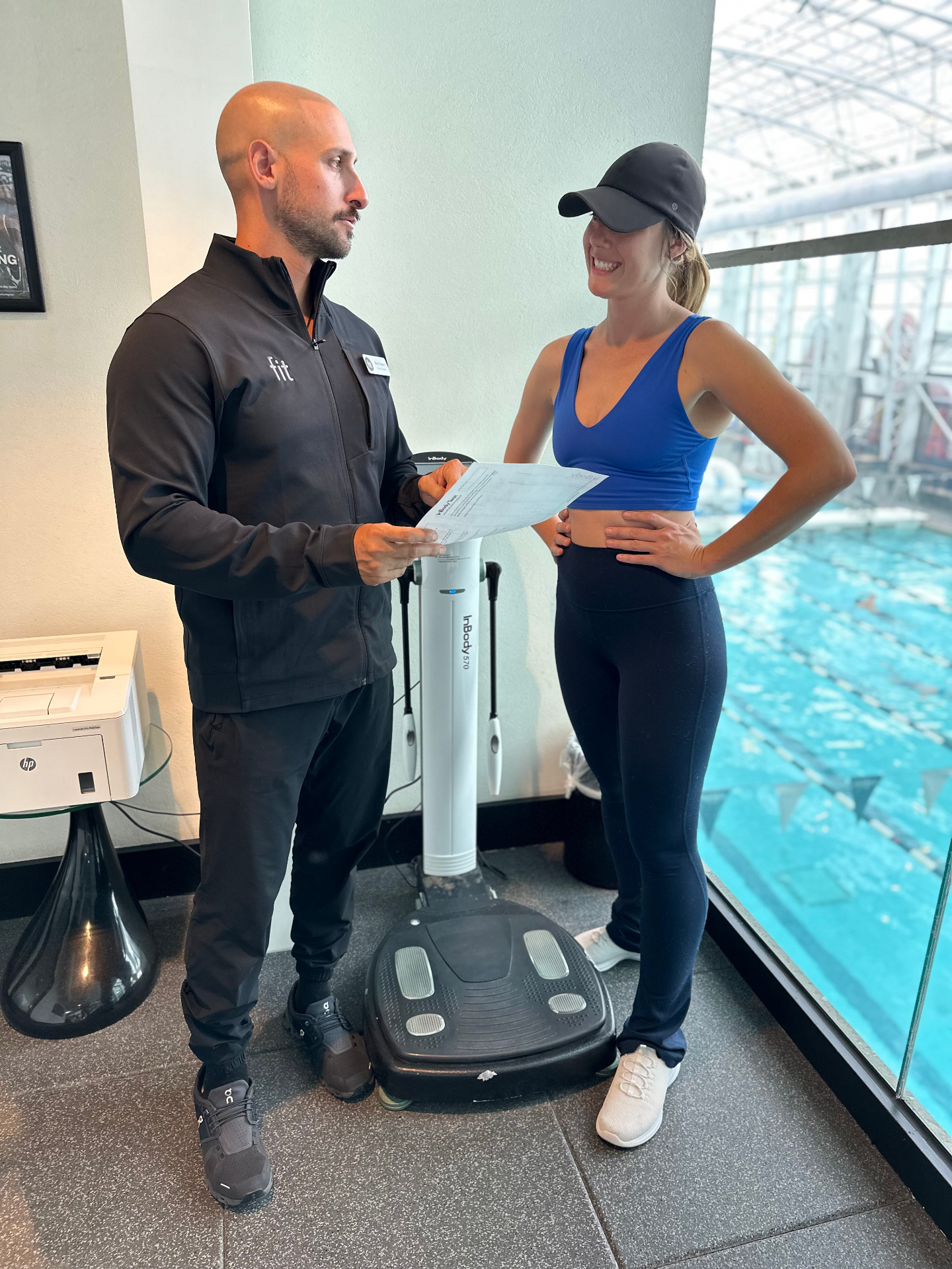 Coach Franco reviewing assessment results with a client